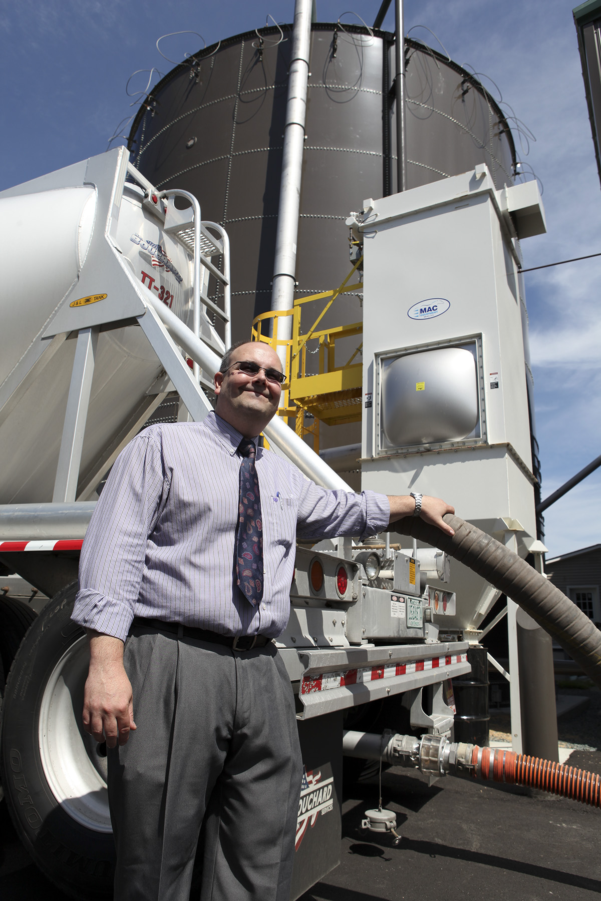 Environmental portrait of engineering staff at The Jackson Laboratory's Energy Center wood-fired pellet plant in Bar Harbor, Maine.